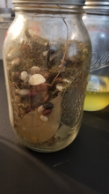Load image into Gallery viewer, This is an image of my jar of money attracting herbs used in my ritual.
